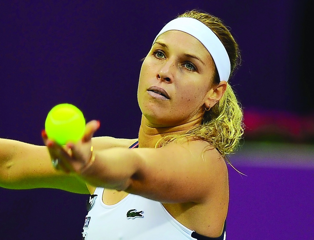 Dominika Cibulkova of Slovakia prepares to serve against Australia’s Samantha Stosur during their Qatar Total Open Quarter-final played at the Khalifa International Tennis Complex in Doha yesterday. Cibulkova won 7-5. 6-4.