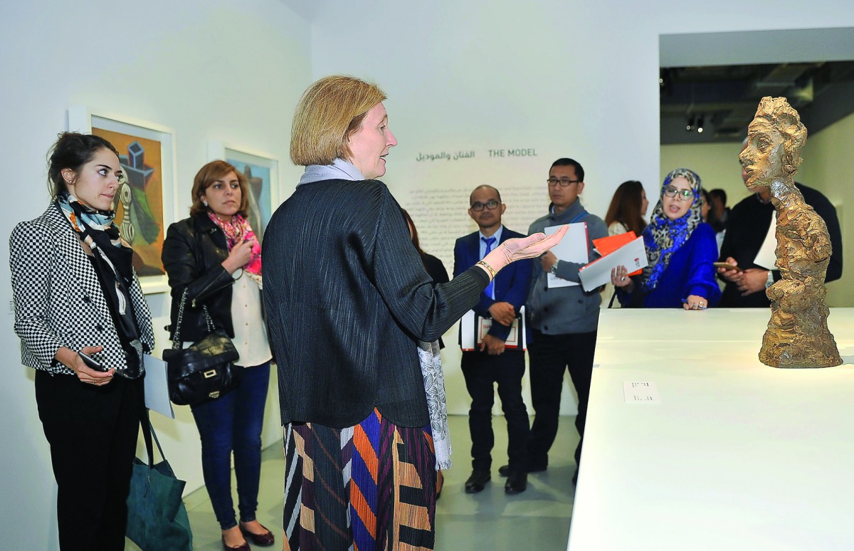 Catherine Grenier, Director of Fondation Giacometti taking the media on a tour during Picasso & Giacometti exhibition at Fire Station's Garage Gallery, Doha, yesterday. Pic: Baher Amin / The Peninsula