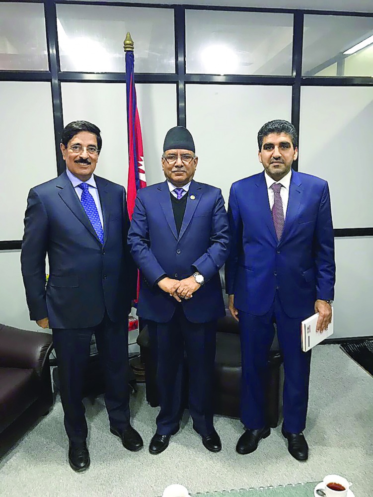 H E Dr Hamad Bin Abdulaziz Al Kawari, Cultural Adviser at the Emiri Diwan and Qatar's candidate for the post of Unesco Director-General, with Nepal Prime Minister Pushpa Kamal Dahal