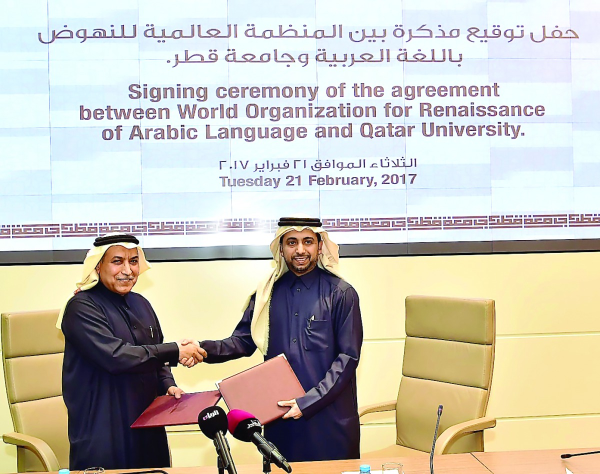 WORAL Director-General Dr Ali Ahmed Al Kubaisi with QU President Dr Hassan Rashid Al Derham.