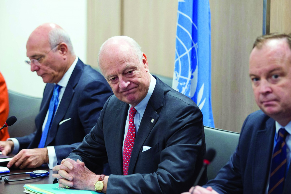 United Nations (UN) Syria envoy Staffan de Mistura (centre) looks on during a meeting on the second day of a new round of Syria peace talks in Geneva yesterday. 
