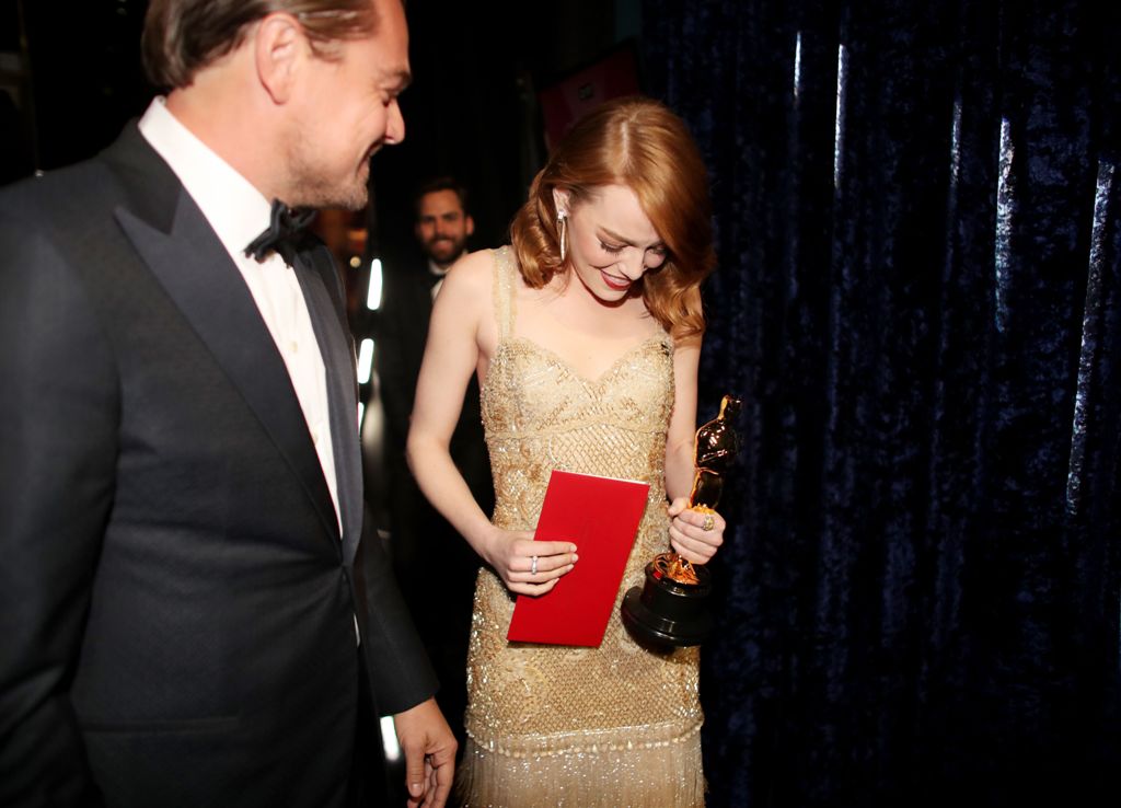HOLLYWOOD, CA - FEBRUARY 26: Actor Leonardo DiCaprio (L) and actress Emma Stone, winner of Best Actress for 'La La Land' pose backstage during the 89th Annual Academy Awards at Hollywood & Highland Center on February 26, 2017 in Hollywood, California. Chr