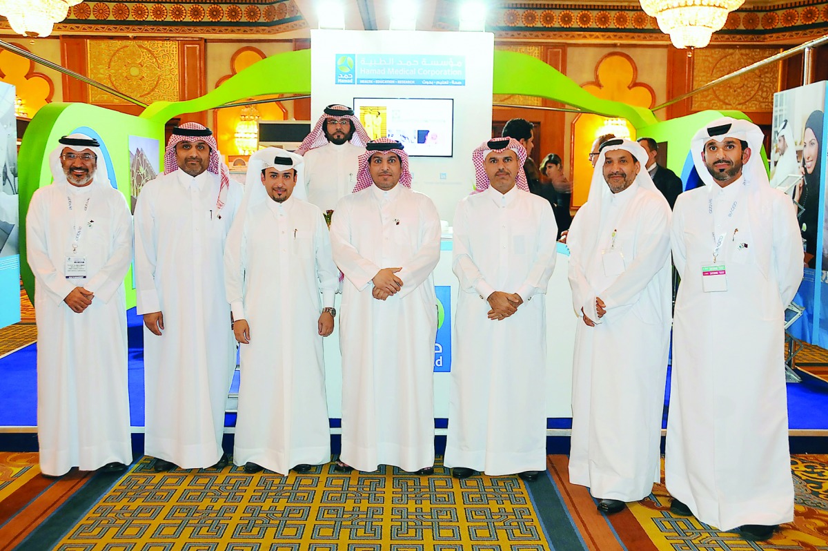 Qatari embassy officials in Cairo with HMC delegation pose for a group photo.