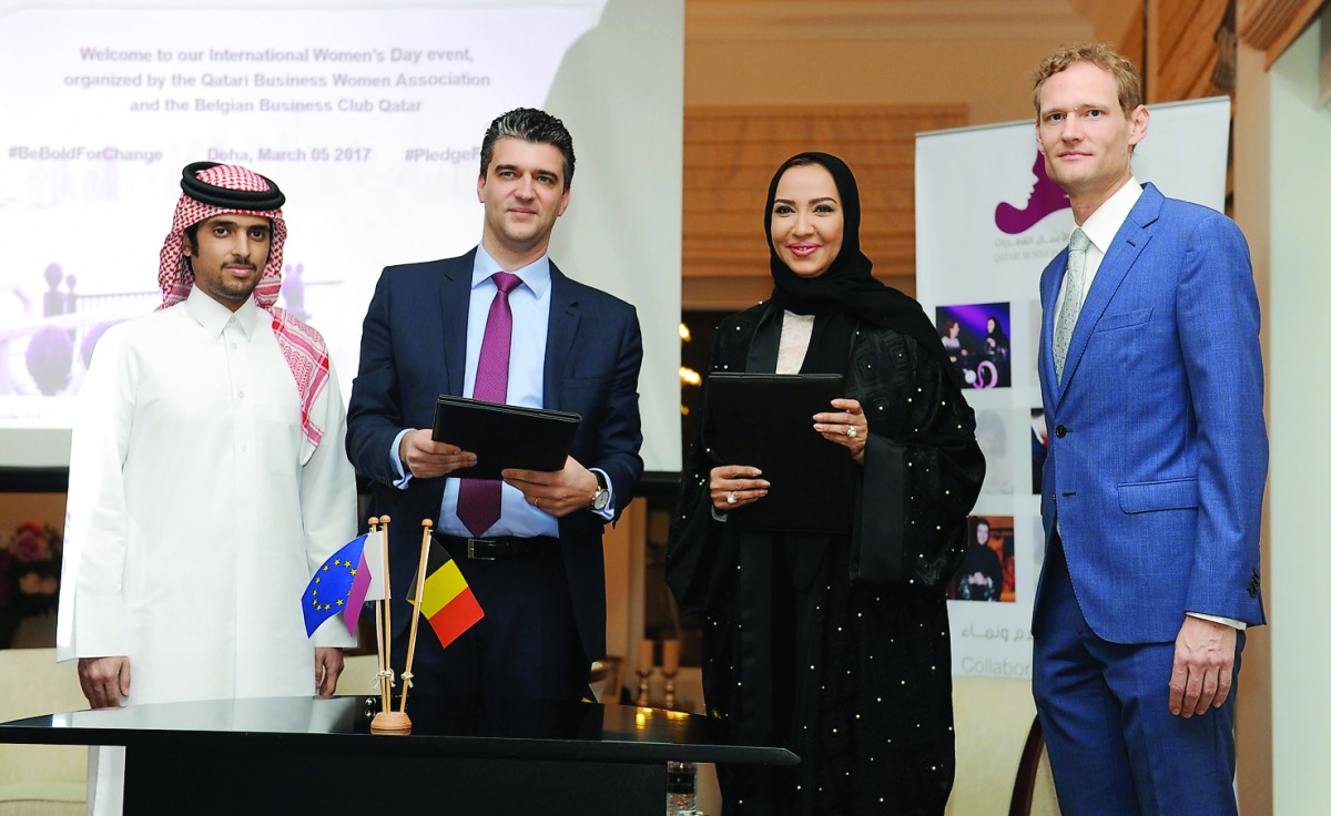 Luk Kelles (second left), Founder and Chairman, Belgium Business Club Qatar (BBCQ), and Amal Abdullah Al Aathem exchanging documents after signing an MoU at the Belgium Embassy. Sheikh Turki bin Faisal bin Qassim Al Thani (left), Honorary President, BBCQ;