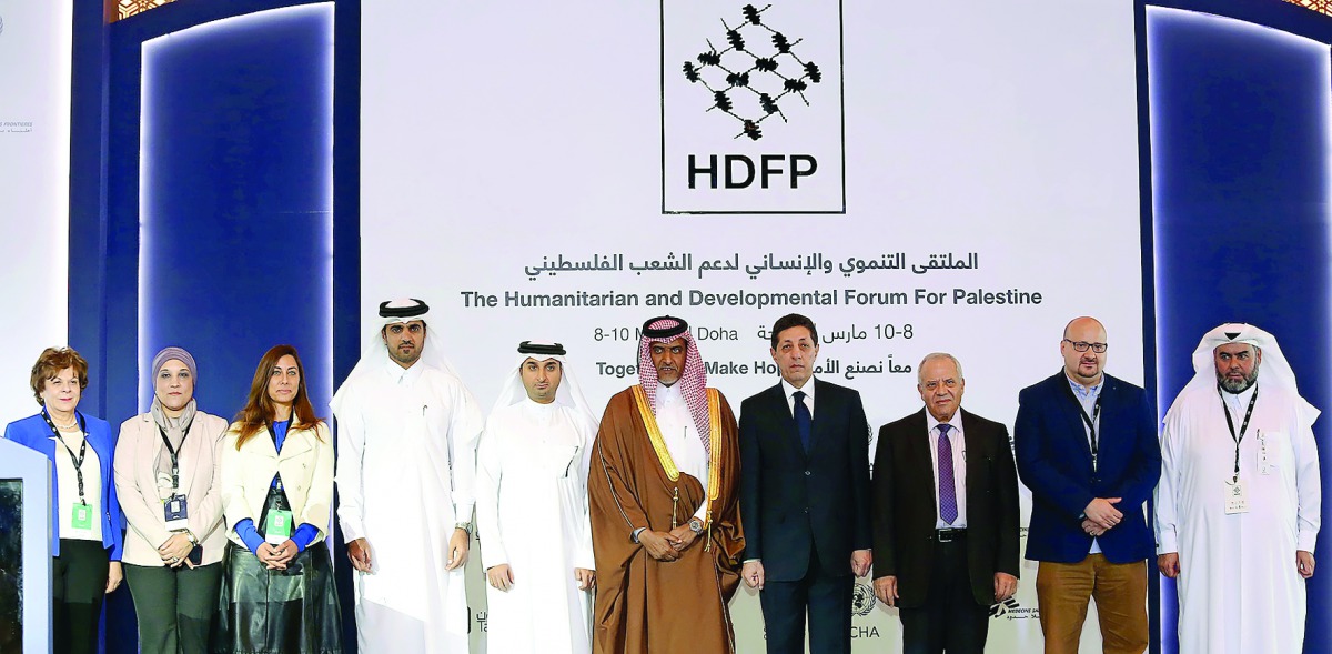 Officials at the Humanitarian and Development Forum for Palestine held under the theme 'Together We Make Hope' in Doha yesterday. 