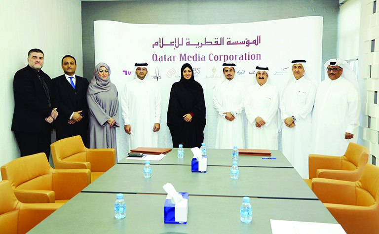 Officials at the signing ceremony.