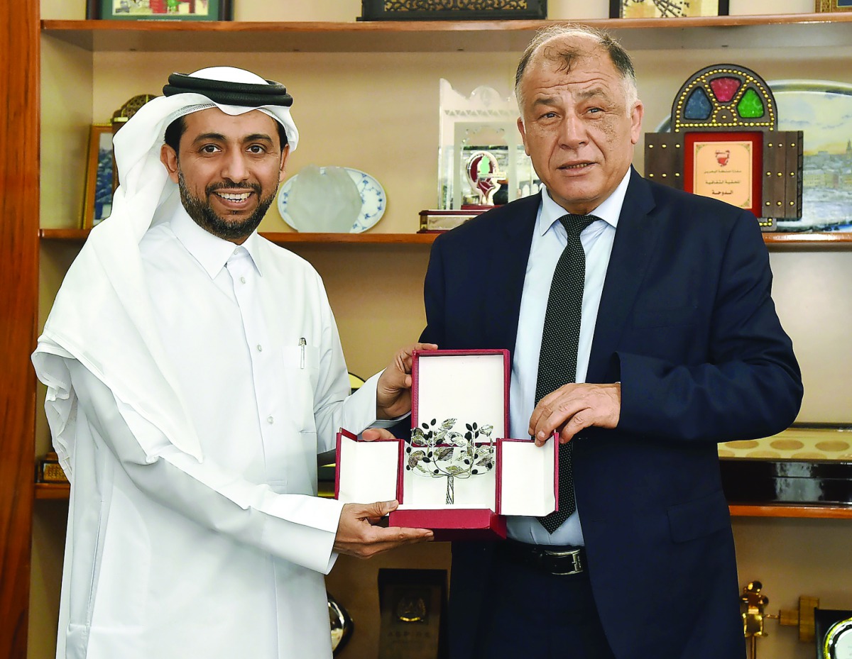 QU President Dr Hassan Al Derham (left) with the Minister of Education of the Republic of Tunisia, Dr Neji Jalloul. 