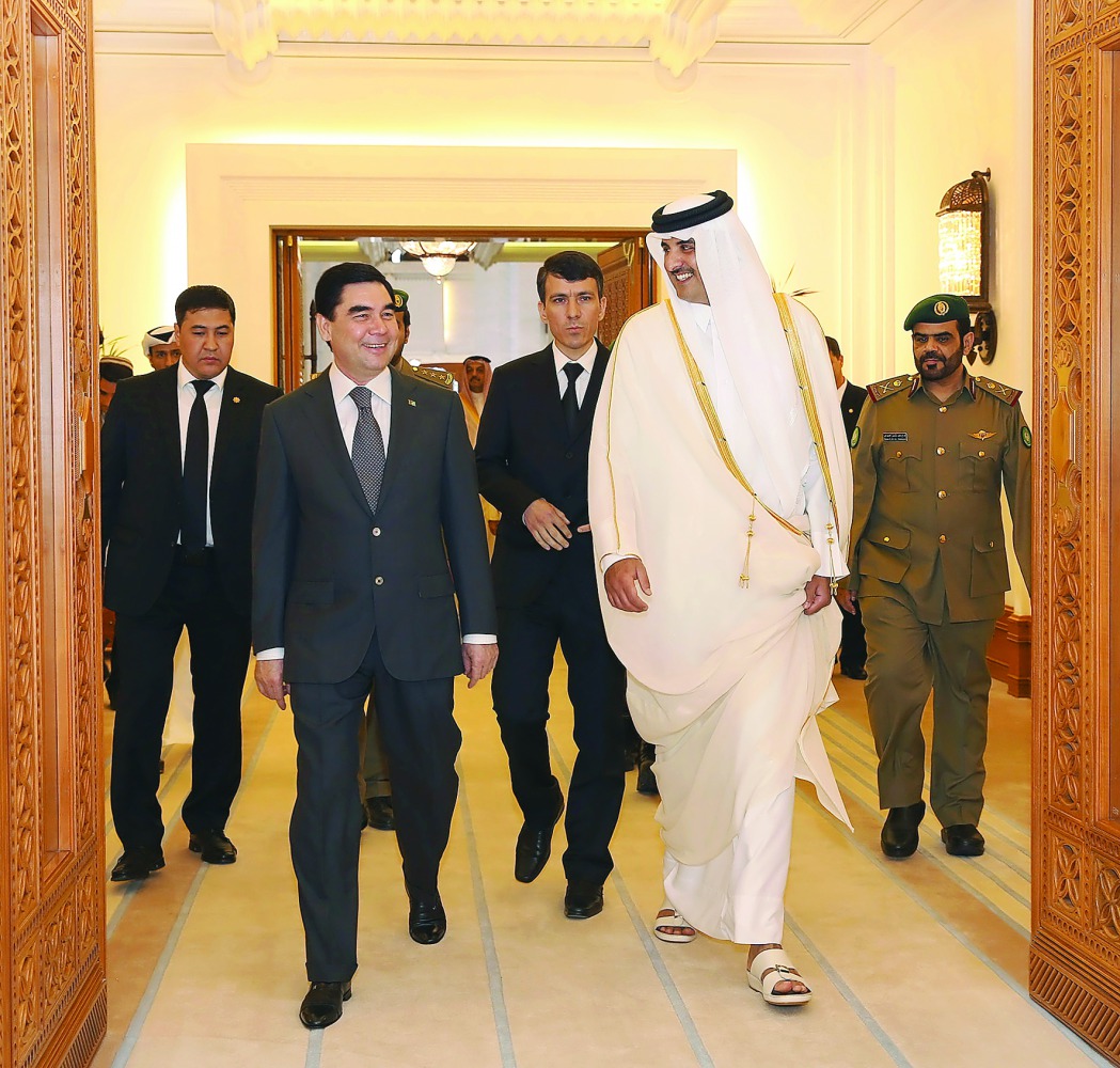 Emir H H Sheikh Tamim bin Hamad Al Thani with Turkmenistan President Gurbanguly Berdimuhamedow, at Emiri Diwan yesterday. Talks dealt with bilateral relations and means of enhancing them in all fields, especially in the energy, environment and investment 