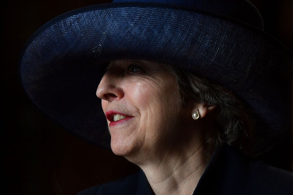 British Prime Minister Theresa May leaves after attending a Commonwealth Day Service at Westminster Abbey in central London, on March 13, 2017. AFP / POOL / Ben STANSALL

