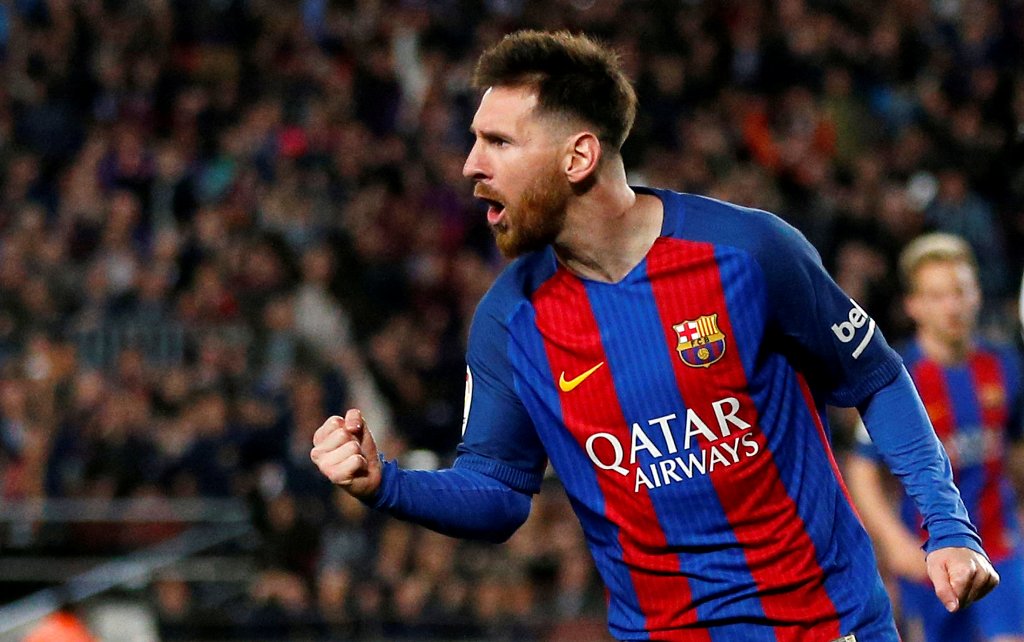 Barcelona's Lionel Messi celebrates his second goal. REUTERS/Juan Medina
