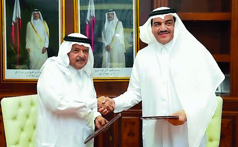 H E Mohamed bin Abdullah Al Rumaihi (right), Minister of Municipality and Environment and Sheikh Faisal bin Qassim Al Thani, Chairman of the Board of Trustees of Al Faisal Without Borders Foundation, at the MoU signing event. 