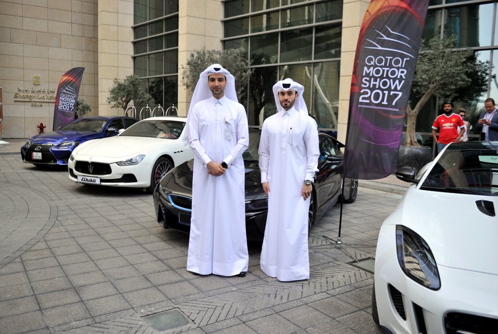 Ahmed Al Obaidli, Director Exhibitions department Qatar tourism authority (left) and Ahmed Al Mulla COO- Entertainment Elan Group posing front of luxury cars after the Press conference of Qatar Motor Show 2017 in Doha Pic: Abdul Basit