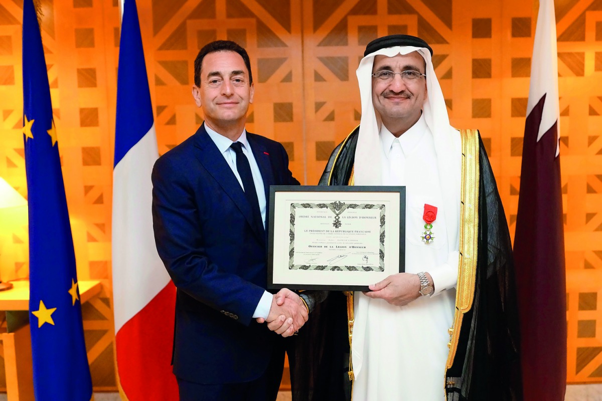 Ambassador of France, Eric Chevallier, presenting the insignia of Officer of the Legion of Honor to Bader Abdullah Al Darwish, Chairman and Managing Director of Darwish Holding.