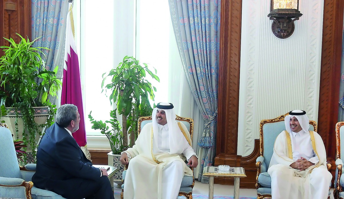 Emir H H Sheikh Tamim bin Hamad Al Thani with Prime Minister of Saint Vincent and the Grenadines Ralph Gonsalves at the Emiri Diwan yesterday. The meeting was attended by Prime Minister and Interior Minister H E Sheikh Abdullah bin Nasser bin Khalifa Al T