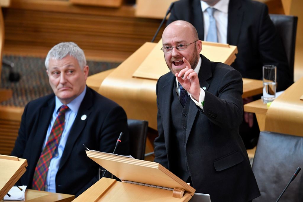 Scottish Green Party co-convener Patrick Harvie (R) speaks in the chamber on the first day of the 'Scotland's Choice' debate on a motion to seek the authority to hold an indpendence referendum at the Scottish Parliament in Edinburgh on March 21, 2017.  AF