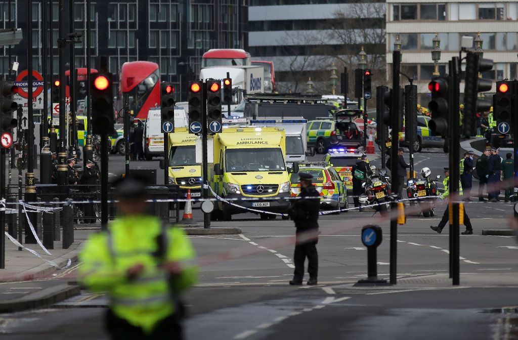 A man mowed down pedestrians on a bridge near the British parliament and stabbed a policeman on Wednesday, killing three people before being shot and killed by police.