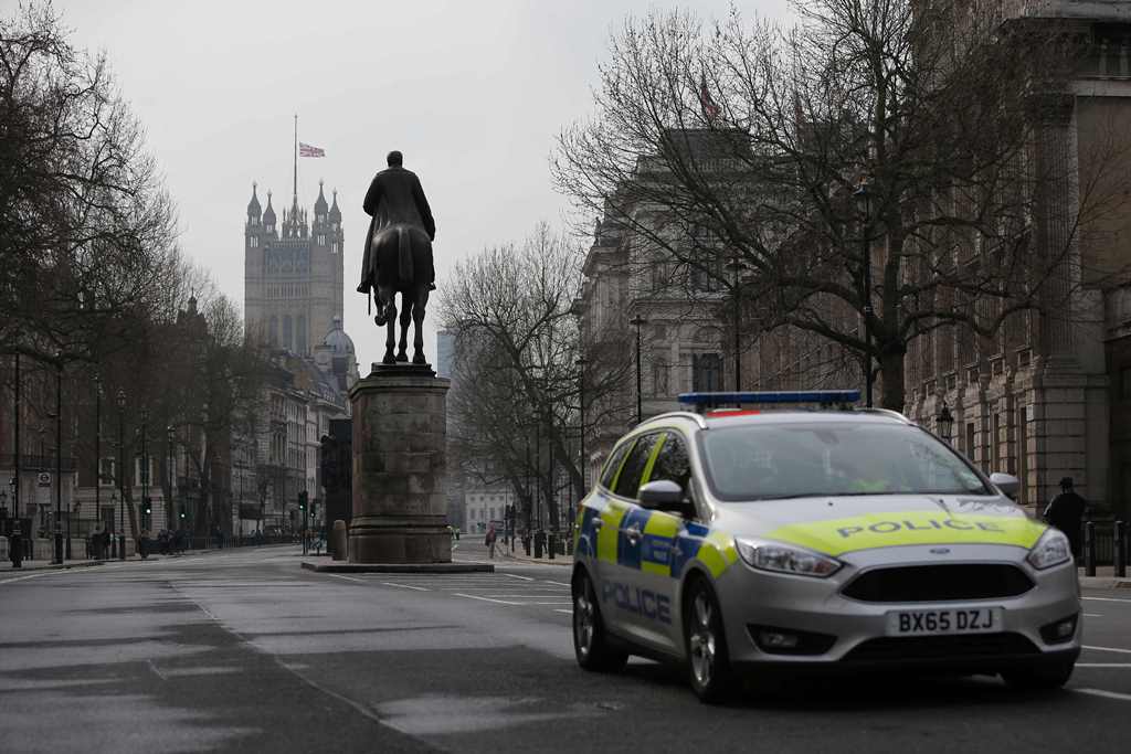 A Union flag flies at half mast from the Houses of Parliament on March 23, 2017. AFP / Daniel LEAL-OLIVAS
