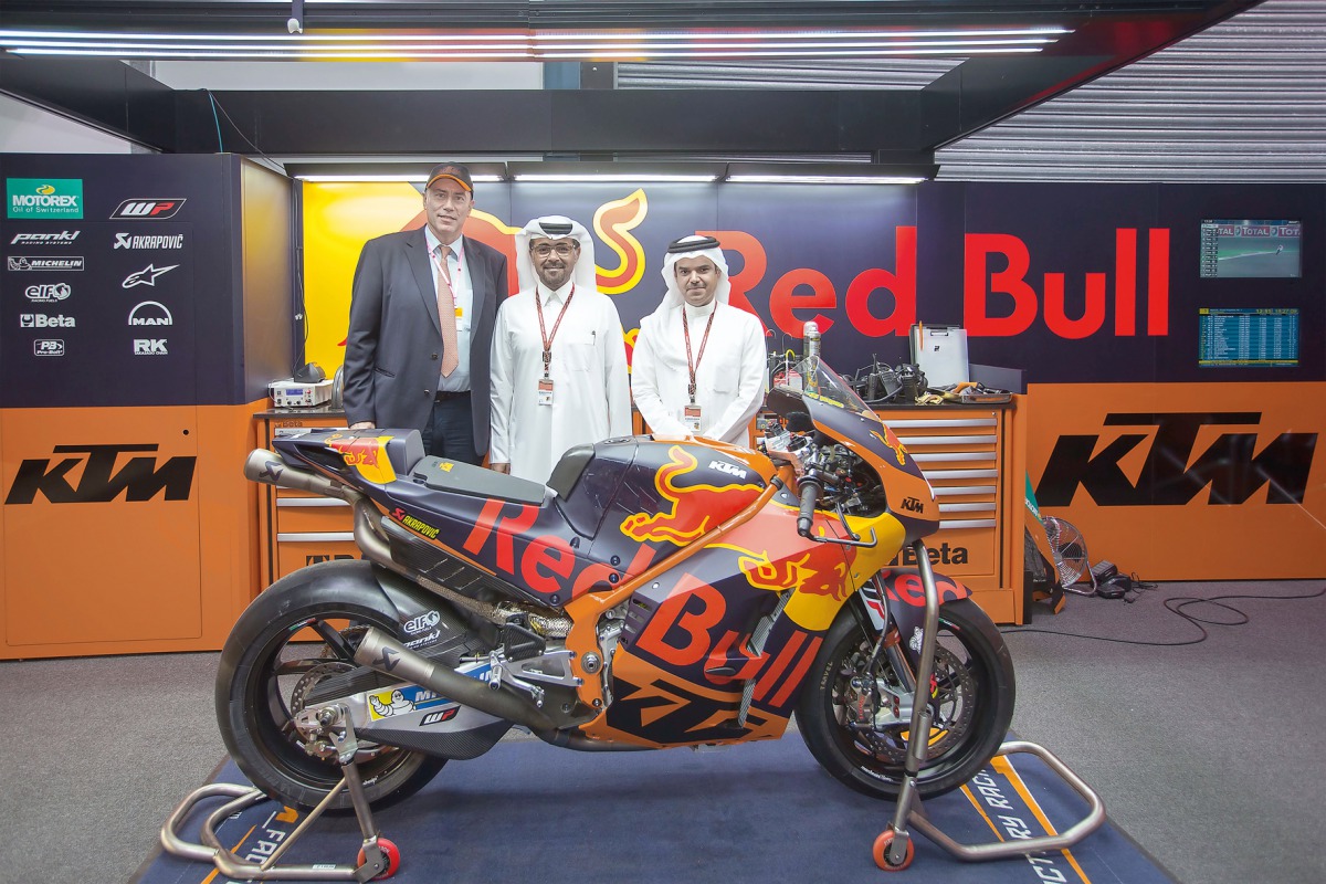 Abdulrahman Al Mannai; President of Qatar Motor and Motorcycle Federation (QMMF), Willy Kempel; Austrian Ambassador to Qatar, and Khalid Al Remaihi; Vice President and GM of Losail Circuit Sports Club during the launch of the Red Bull KTM Factory Racing i