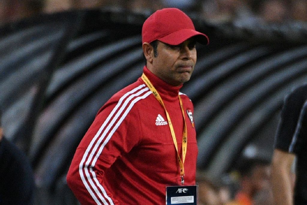 United Arab Emirates (UAE) coach Mahdi Ali Hassan wataches the action in their World Cup qualifying football match against Australia in Sydney on March 28, 2017.  AFP / WILLIAM WEST