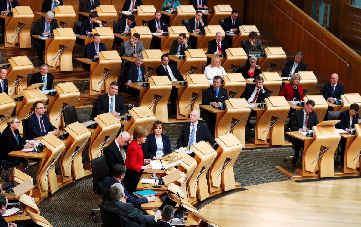 Scotland's First Minister Nicola Sturgeon stands and speaks in the chamber on the second day of the 'Scotland's Choice' debate on a motion to seek the authority to hold an indpendence referendum, at the Scottish Parliament in Edinburgh, on March 28, 2017.