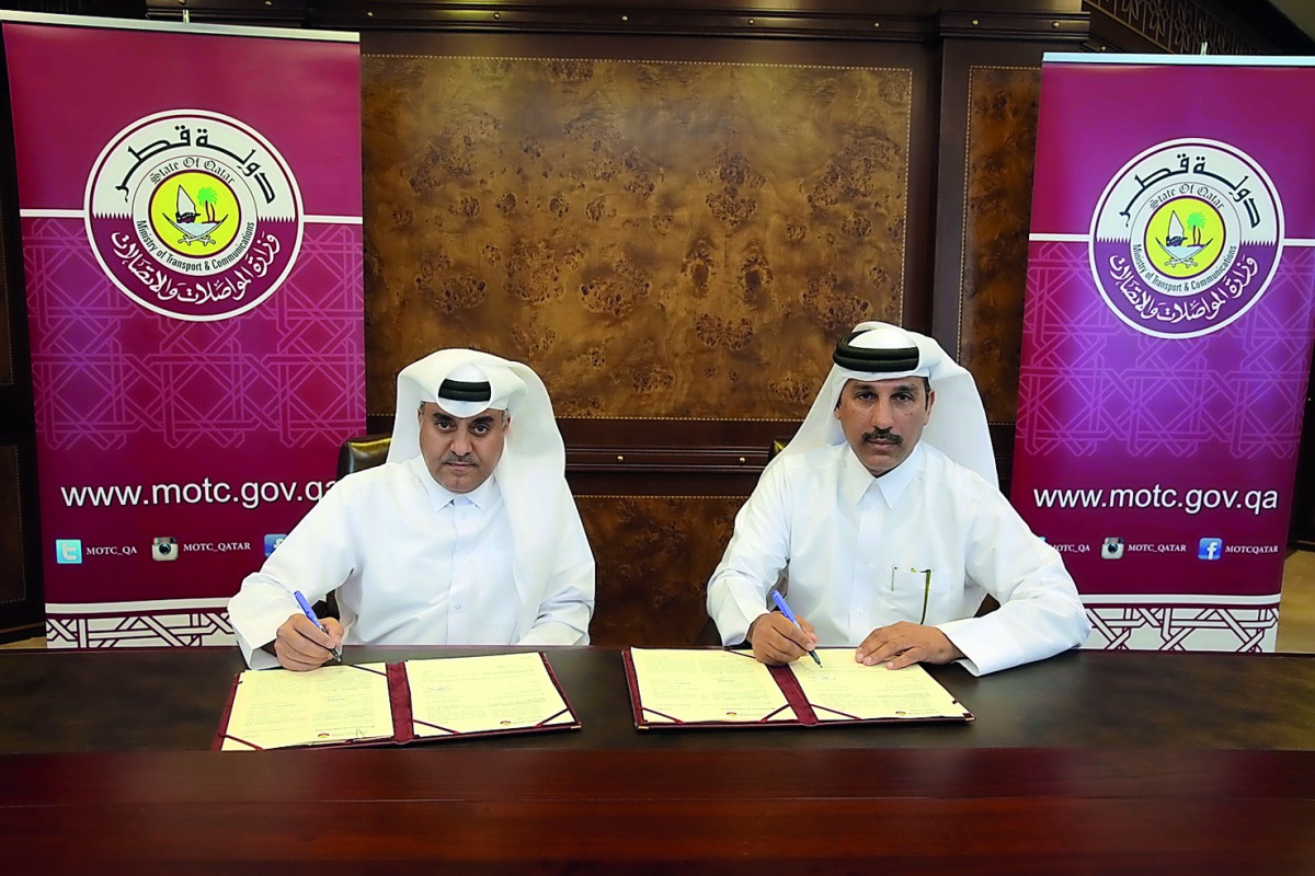 Officials signing the MoU.