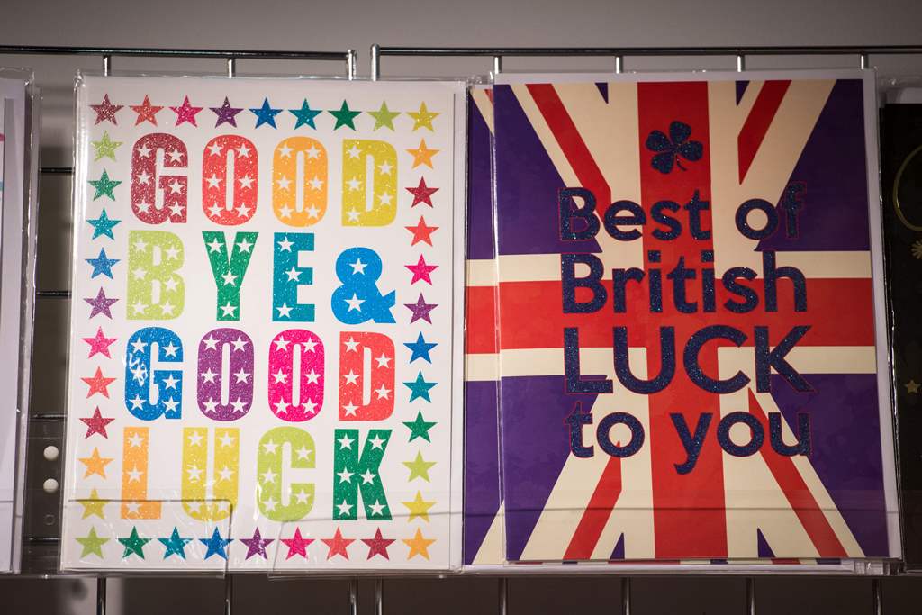 Greeting cards bearing good luck messages are displayed for sale in a stationery shop in Westminster Underground station in London, England on March 29, 2017. AFP / OLI SCARFF

