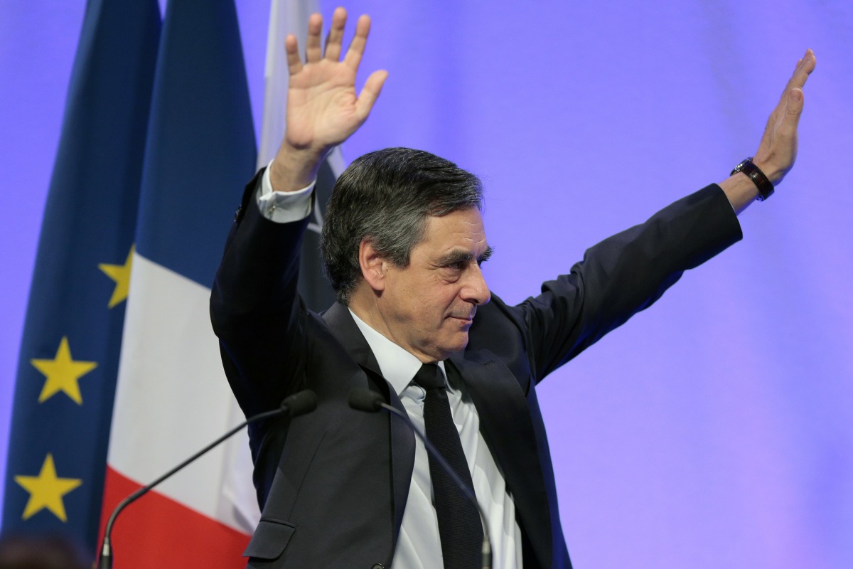 French presidential election candidate for the right-wing Les Republicains (LR) party Francois Fillon gives a speech during a campaign meeting in Sarrola-Carcopino, near Ajaccio, on April 1, 2017 during a visit on the French Mediterranean island of Corsic