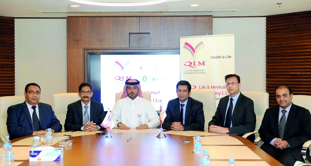Salem Al Mannai (third left), Deputy Group President & CEO of Qatar Insurance Company (QIC) MENA, with other officials, at a media briefing at the QIC headquarters in Doha yesterday. Pic: Salim Matramkot /The Peninsula