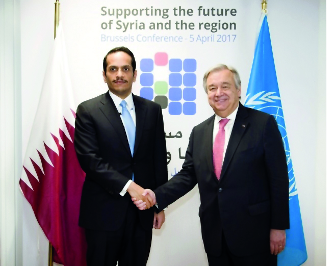 Foreign Minister H E Sheikh Mohammed bin Abdulrahman Al Thani with UN Secretary-General Antonio Guterres and (RIGHT) Lebanese Prime Minister Saad Hariri in Brussels yesterday.