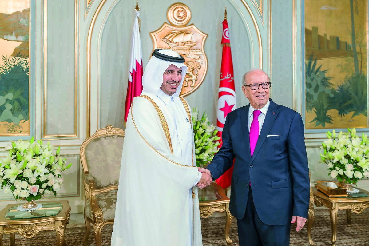 President of Tunisia, Beji Caid Essebsi, with Prime Minister and Interior Minister H E Sheikh Abdullah bin Nasser bin Khalifa Al Thani at the Presidential Palace in Tunis yesterday. 