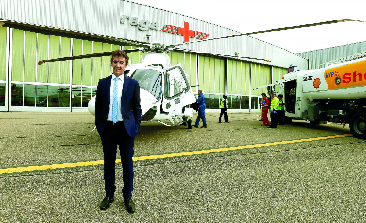CEO Ernst Kohler of Swiss air rescue company REGA poses in front of Leonardo AW169 helicopter, which REGA plans to put into service starting in 2021, after the annual news conference in Kloten, Switzerland April 6, 2017. REUTERS/Arnd Wiegmann