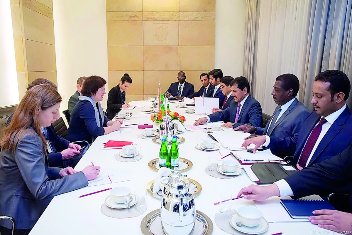 Qatari and Polish officials during talks in Warsaw.