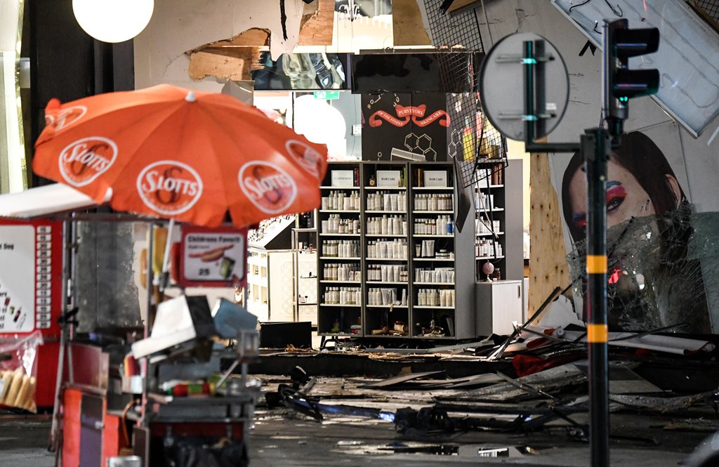 Damage to the department store Ahlens is seen after the beer truck was towed away after a suspected terror attack on the Drottninggatan Street in central Stockholm, Sweden, April 8, 2017. Maja Suslin/TT News Agency/via Reuters
