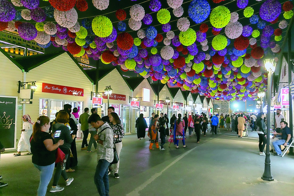 People throng the Magical Festival Village located at the cultural district of Katara. 