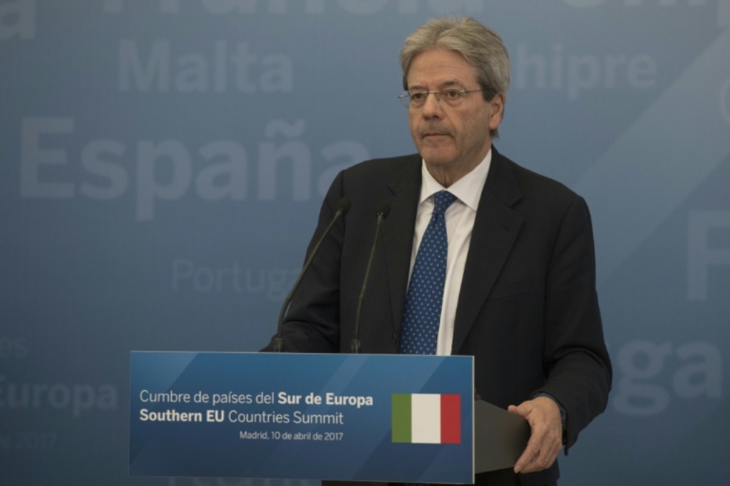 Italian Prime Minister Paolo Gentiloni speaks during a press conference on April 10, 2017 at the Palacio del Pardo, near the Spanish capital Madrid, following a summit of southern European Union countries/AFP.