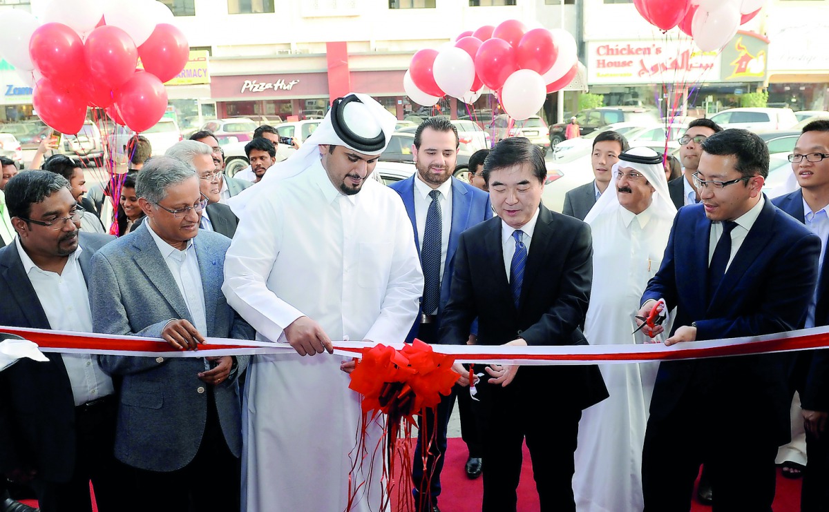 China's Ambassador to Qatar Li Chen and Intertec Group Managing Director Abdulla Khalifa Abdulla Turkey Al Subaey inaugurating Intertec's first exclusive Huawei showroom in Qatar. 
