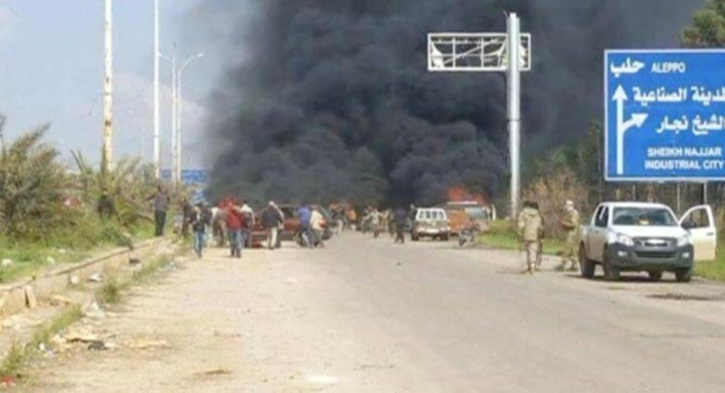 Still image shows a cloud of black smoke rising from vehicles in the distance in what is said to be Aleppo's outskirts, Syria April 15, 2017. Social Media Website via Reuters TV.