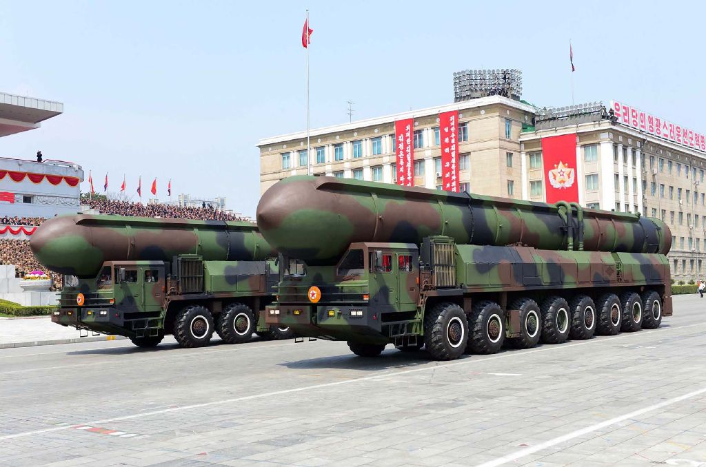 This April 15, 2017 picture released from North Korea's official Korean Central News Agency (KCNA) on April 16, 2017 shows Korean People's ballistic missiles being displayed through Kim Il-Sung square during a military parade in Pyongyang marking the 105t