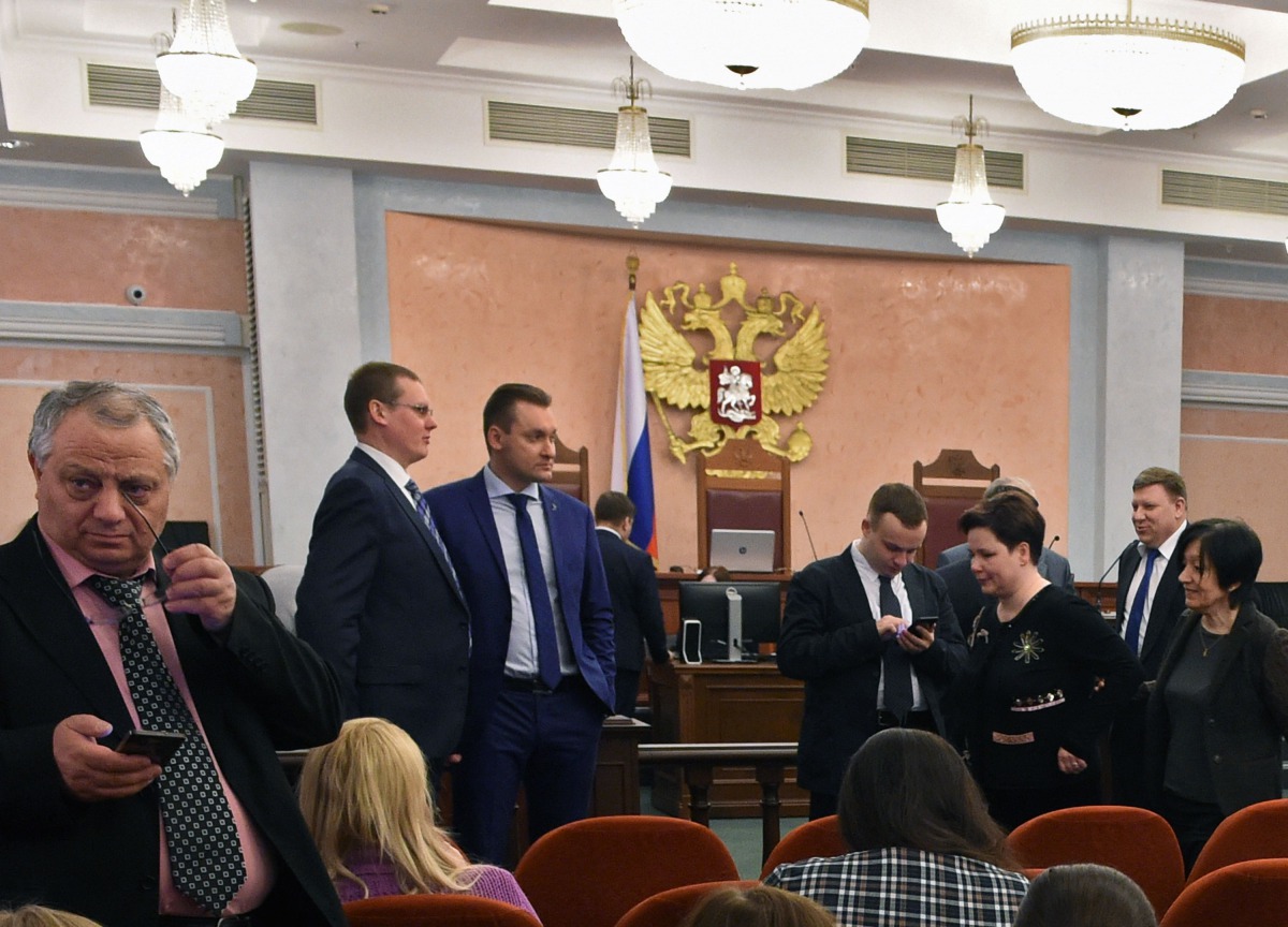 Participants attend a hearing on the justice ministry request to ban the Jehovah's Witnesses at Russia's Supreme Court in Moscow on April 20, 2017. Russia's Supreme Court on April 20 issued a ruling banning Jehovah's Witnesses after finding the group to b