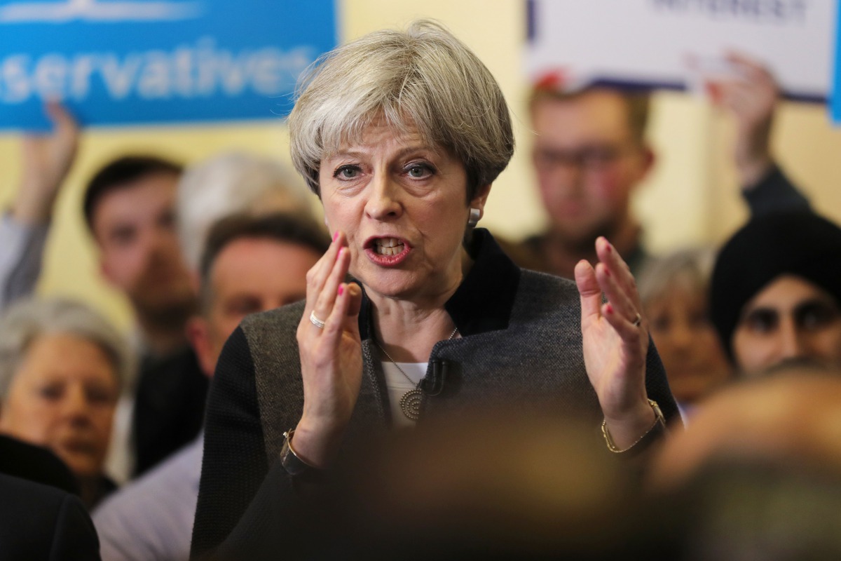 British Prime Minster Theresa May delivers a stump speech at Netherton Conservative Club in Dudley in the West Midlands, during the Conservative Party's election campaign. (AFP / POOL / Chris Radburn)