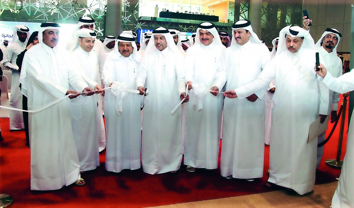 Minister of Transport and Communications, H E Jassim bin Saif Al Sulaiti, and Minister of Administrative Development, Labour and Social Affairs H E Dr Issa bin Saad Al Jafali Al Nuaimi, along with other dignitaries at the opening of Aswaq Qatar.