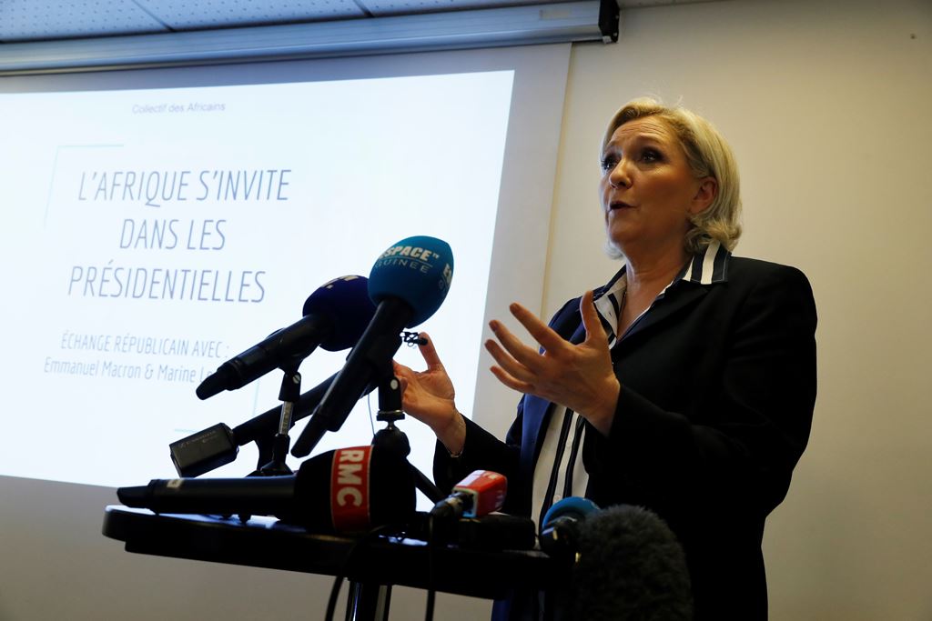 French presidential election candidate for the far-right Front National (FN) party Marine Le Pen (R) speaks during a press conference on Africa-France relationships on May 2, 2017 in Paris. AFP / Thomas Samson
