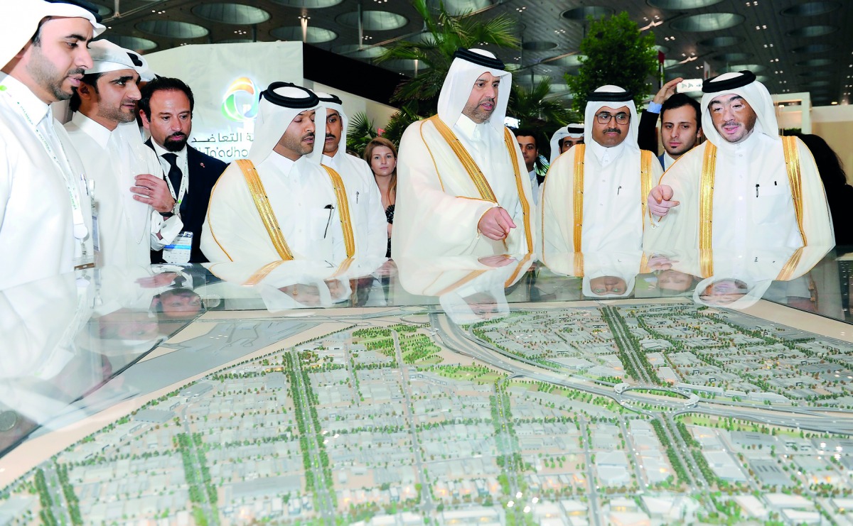 Minister of Economy and Commerce, H E Sheikh Ahmed bin Jassim bin Mohammed Al Thani, Minister of Energy and Industry, H E Dr Mohammed bin Saleh Al Sada, and Manateq CEO, Fahad Rashed Al Kaabi, during the opening of the Project Qatar 2017 exhibition at Doh