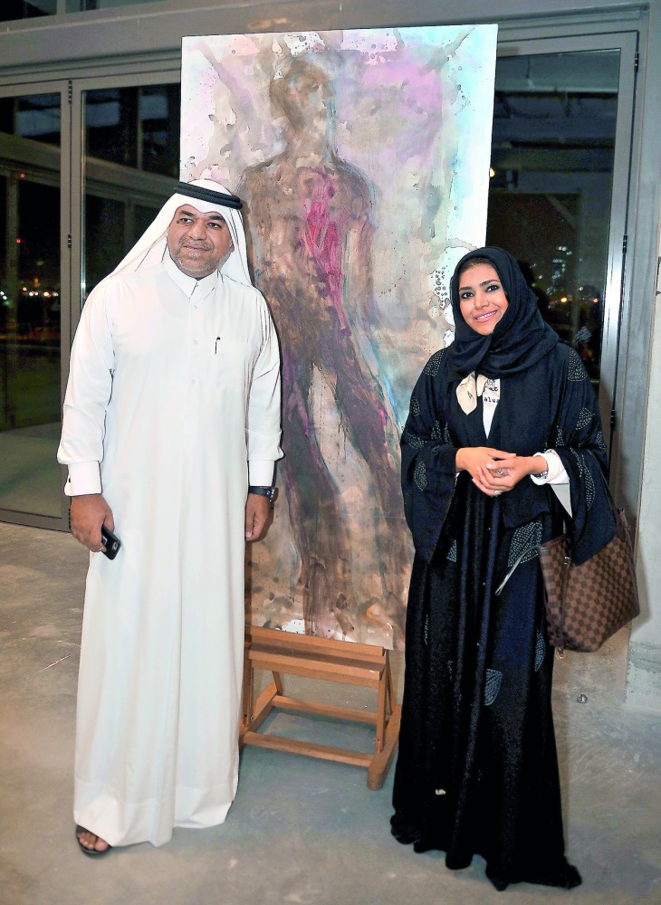 Qatari contemporary artist Ebtisam Al Saffar (right) and Khalifa Al Obaidli, Director of the Fire Station, at the opening of the exhibition. Pic: Baher Amin / The Peninsula