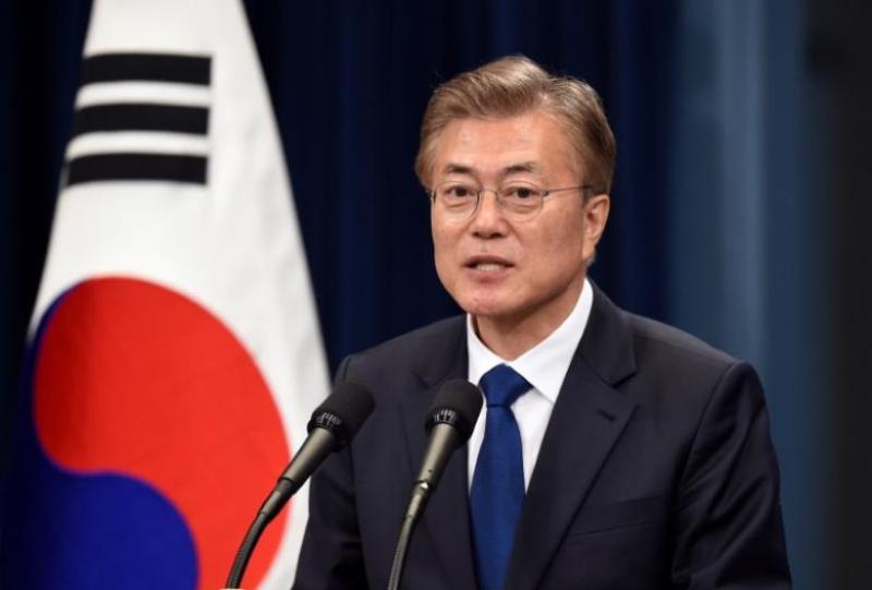 South Korea's new President Moon Jae-In speaks during a press conference at the presidential Blue House in Seoul 