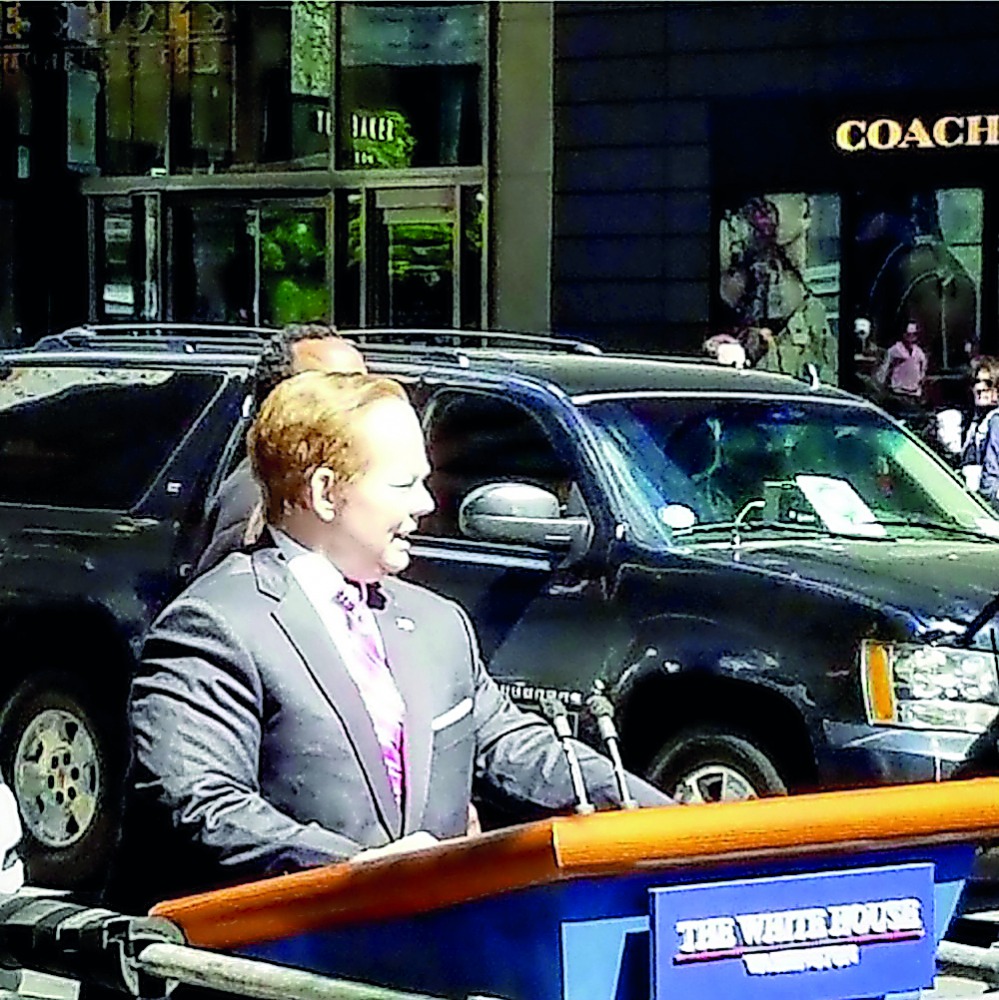 Melissa McCarthy stands on a mobile lectern as she is filmed portraying White House spokesman Sean Spicer for an upcoming episode of Saturday Night Live on the west side of midtown Manhattan, in New York City, New York.