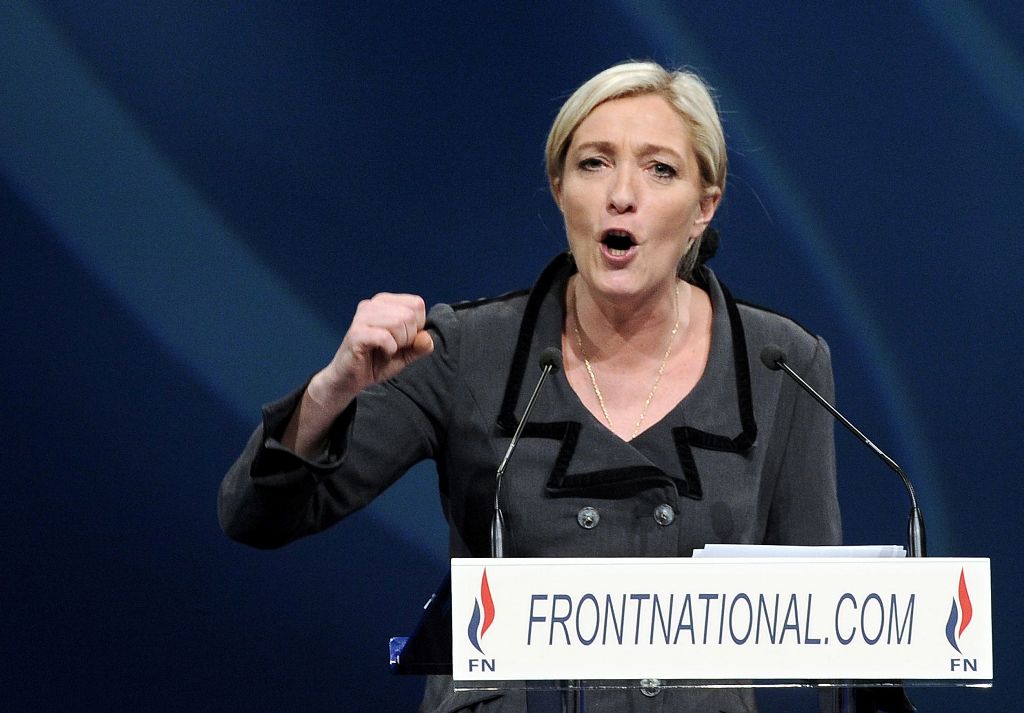 (FILES) This file photo taken on January 16, 2011 shows then newly elected president of French far-right party Front national (National Front) Marine Le Pen delivering a speech during the party's congress, in Tours, western France.   AFP / Miguel MEDINA
