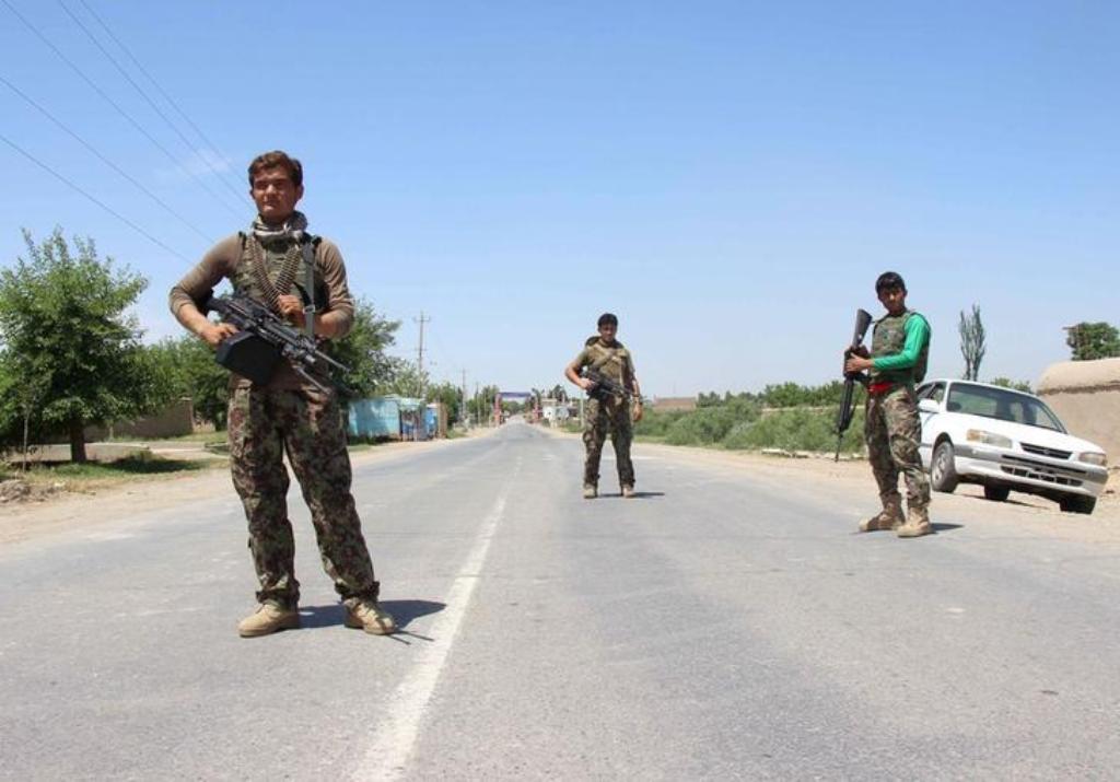 Afghan National Army (ANA) soldiers stand guard during a battle with Taliban in Kunduz provice, Afghanistan May 10, 2017. REUTERS/Nasir Wakif.