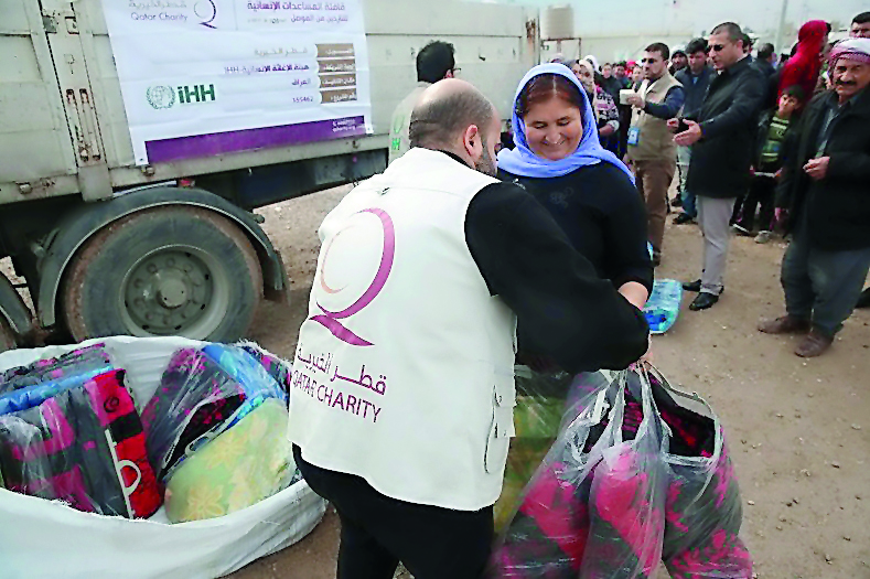 Qatar Charity aid being distributed in Mosul.