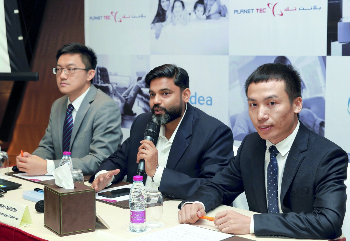 George Jia, Director, RAC Midea Middle East (left); Jayan Menon, General Manager, Planet Tec(centre); and Elvis Wang, General Manager Midea Middle East, during the press event held at Crowne Plaza Doha - The Business Park. Pic: Qassim Rahmatullah / The Pe